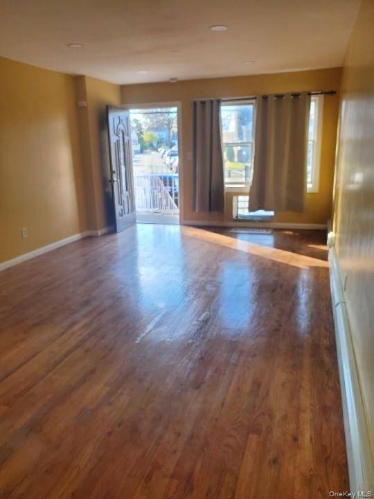 Bright and spacious 3 Bedroom, 2 Bath apartment featuring hardwood floors and plenty of windows that fill the space with natural light.