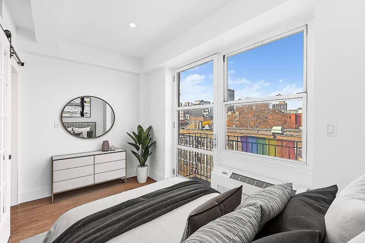 Gorgeous, renovated 1BR apartment with queen sized bedroom, common space perfect for relaxing or entertaining, and a renovated marble bathroom.