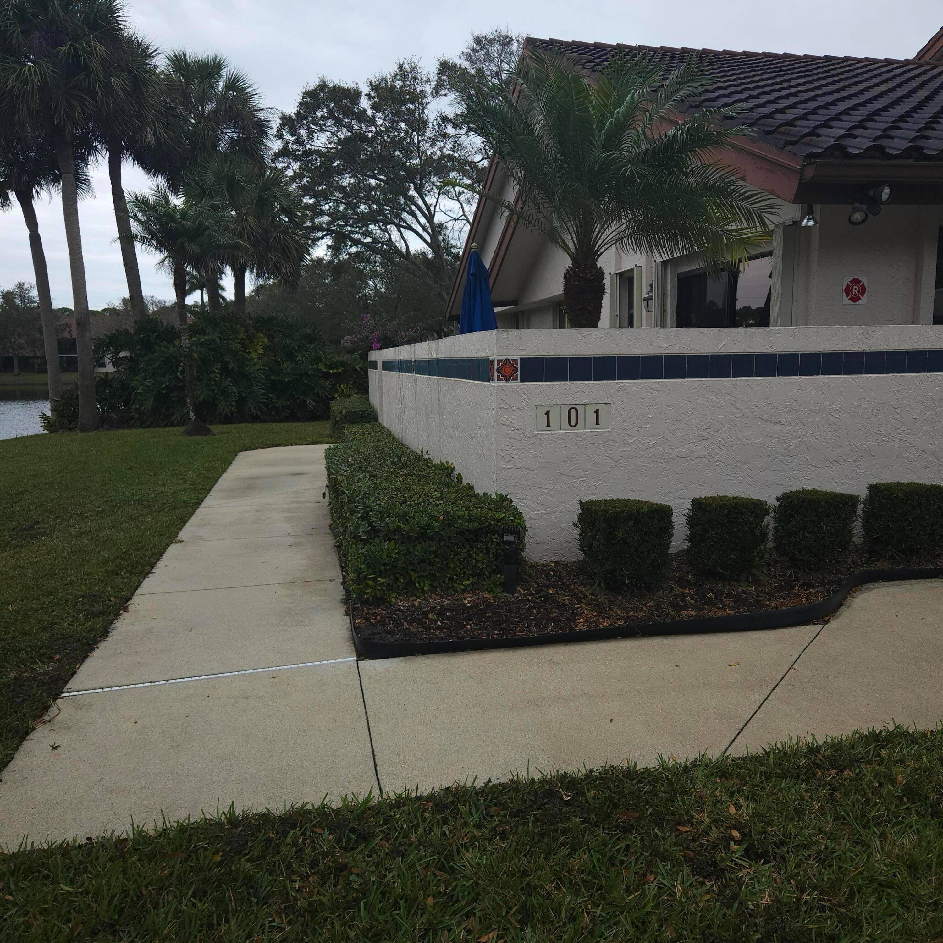 MOTIVATED SELLERS OF THIS VILLA WITH PANORAMIC VIEWS OF POND FROM FLORIDA ROOM.