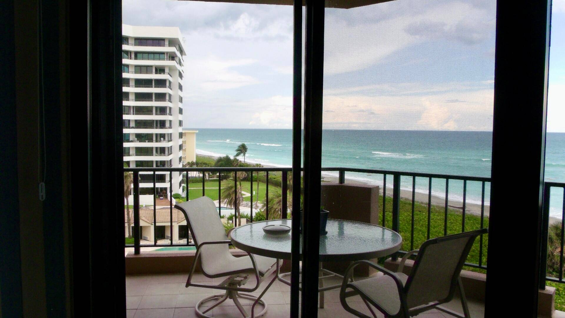 Gorgeous ocean views from Northeast corner unit, with floor to ceiling windows and sliders that lead to a wrap around balcony with panoramic views.