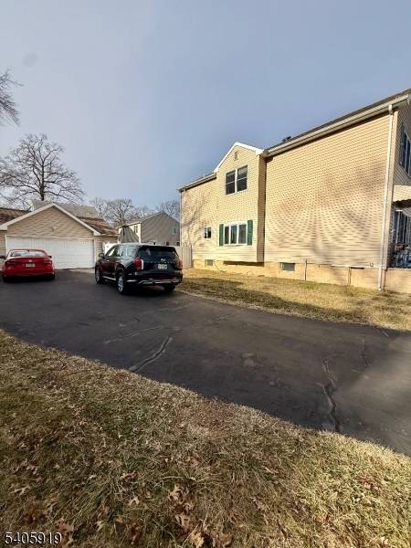 Welcome to 33 West Park Avenue in Avenel, a beautifully maintained 4 spacious bedroom colonial.