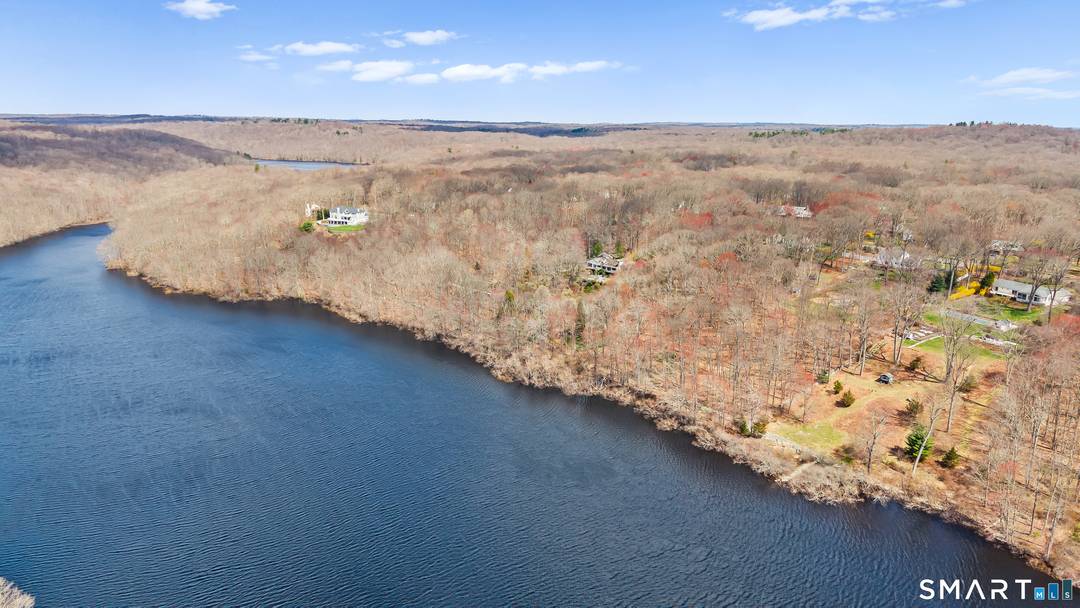 Build your dream home on a quiet cul de sac overlooking Milne Lake.