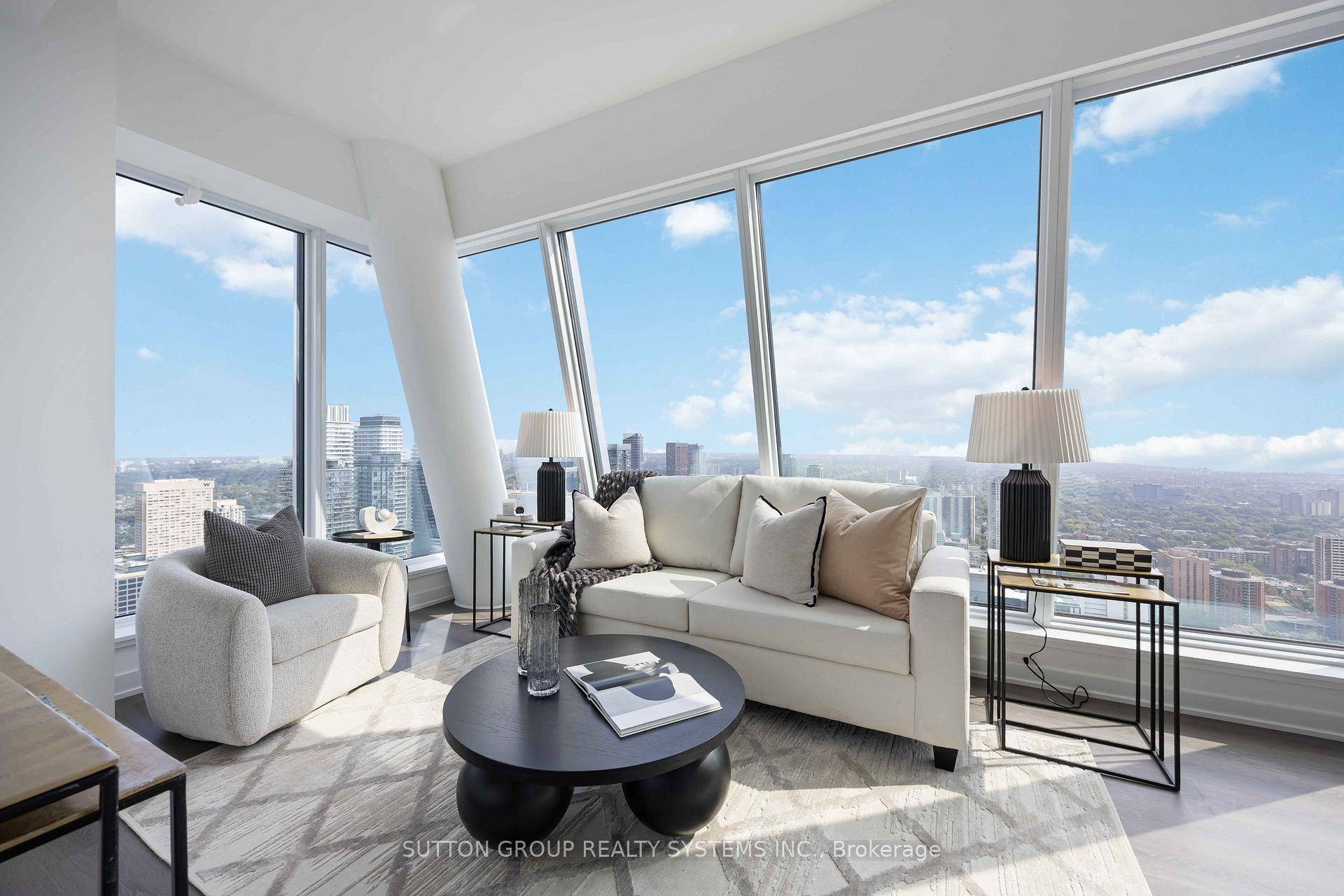 The view says it all ! Stunning, Bright, and Sweeping North East Views from this beautiful Lower Penthouse will leave you in awe !