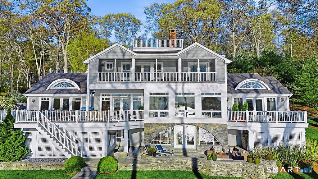 Perched above the CT River with breathtaking panoramic views and unforgettable sunsets from every room, this extraordinary waterfront compound is the definition of luxury coastal living.