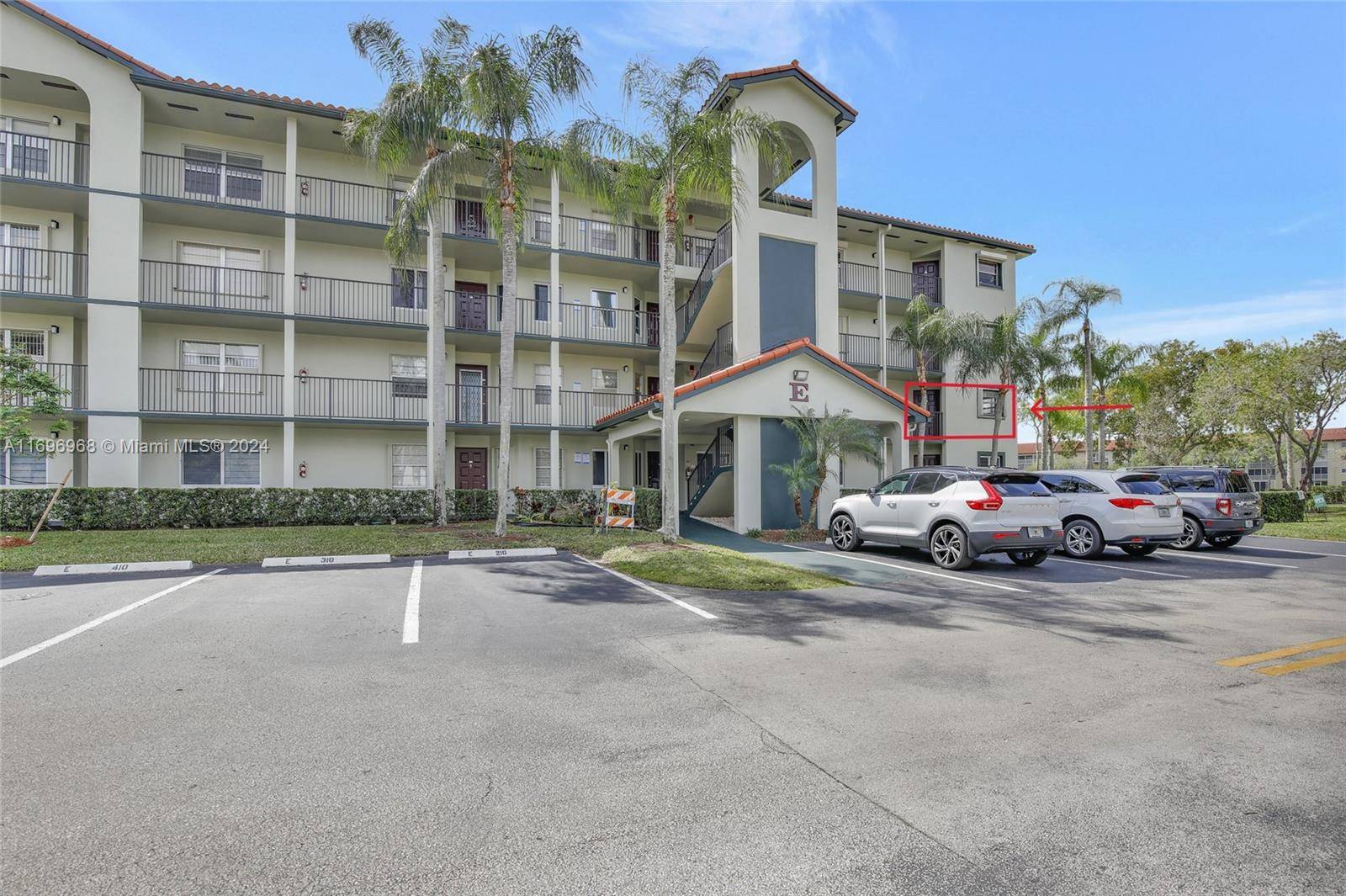 Spacious Magnolia corner unit with a lake view at Century Village, a 55 community.