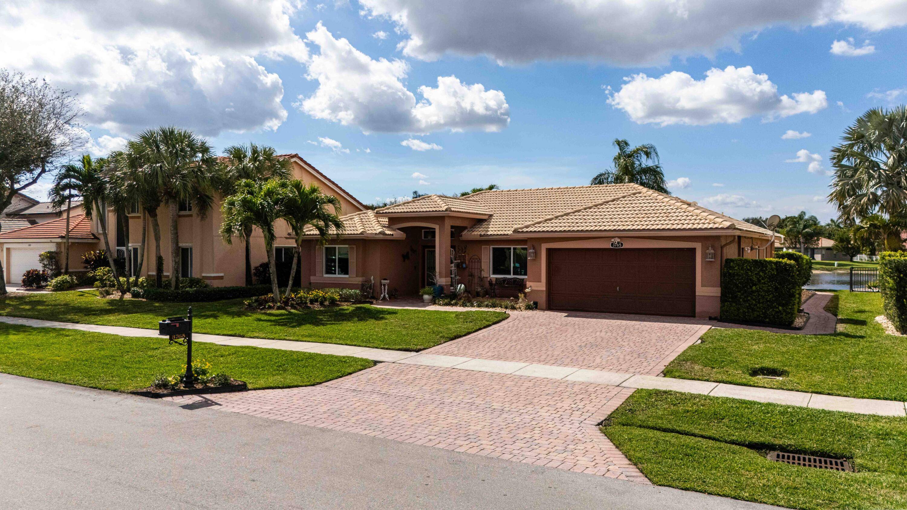 Discover this beautifully updated 3 bedroom, 2 bathroom lake view home in the desirable Cypress Woods community.
