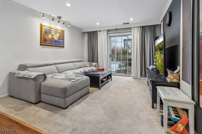 Tucked away at the rear of the building for added privacy, this charming two bedroom condo offers a peaceful setting backing onto open space.