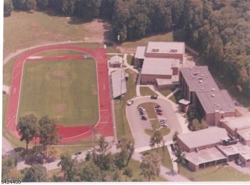 Within the gates of the Smoke Rise gated community in the fabulous town of Kinnelon rests this fabulous brick ranch offering over an acre of park like level property with ...