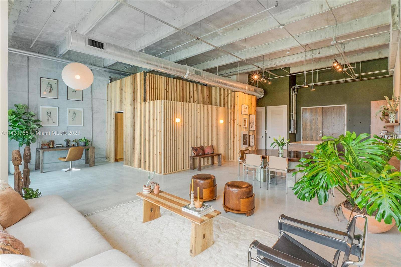 FULLY FURNISHED TWO STORY LOFT WITH 20 FT CEILINGS AT PARC LOFTS WHICH IS CENTRALLY LOCATED BETWEEN DOWNTOWN MIAMI WYNWOOD.