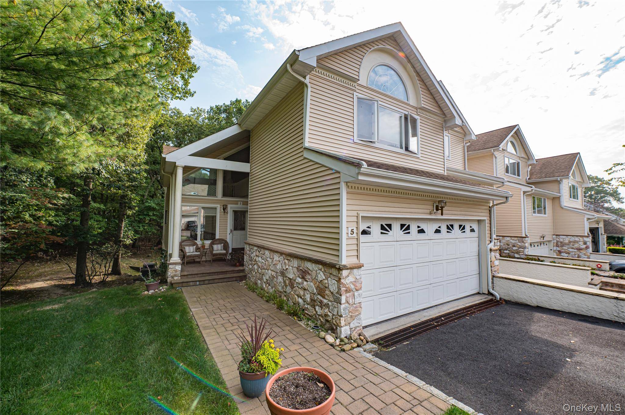 This Well Maintained 4 Bedroom 3 and a Half Bath, Spacious and Beautiful Townhouse Has Soaring Cathedral Ceilings, New Trex Deck, New 2 zone Cac, Abundant Closets, Huge Two Car ...
