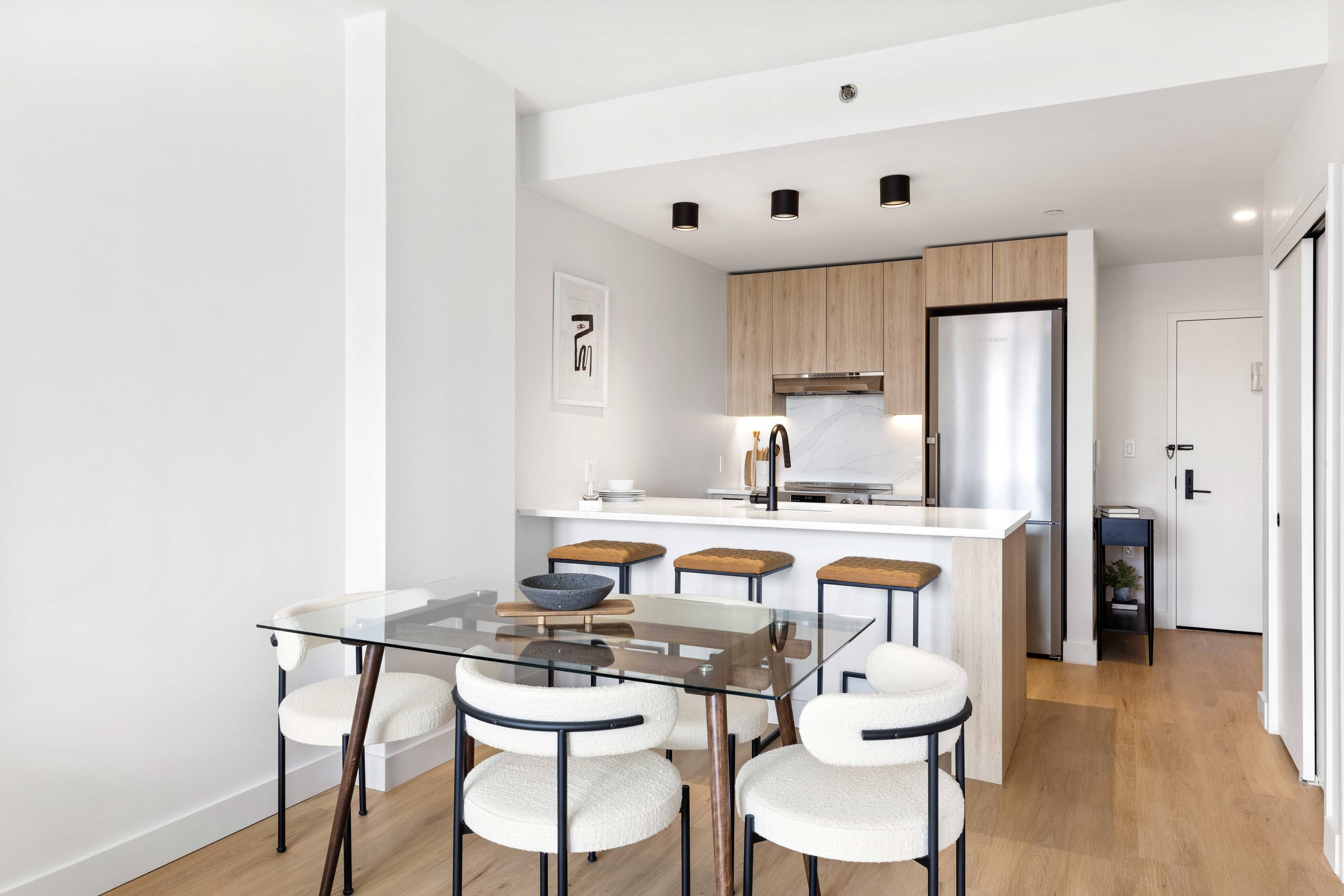 Beautiful one bedroom, one bathroom apartment with a private balcony ; featuring walk in closet, oversized windows, matte black and Calcutta finishes, custom tiled bathrooms, spacious closets, and in unit ...