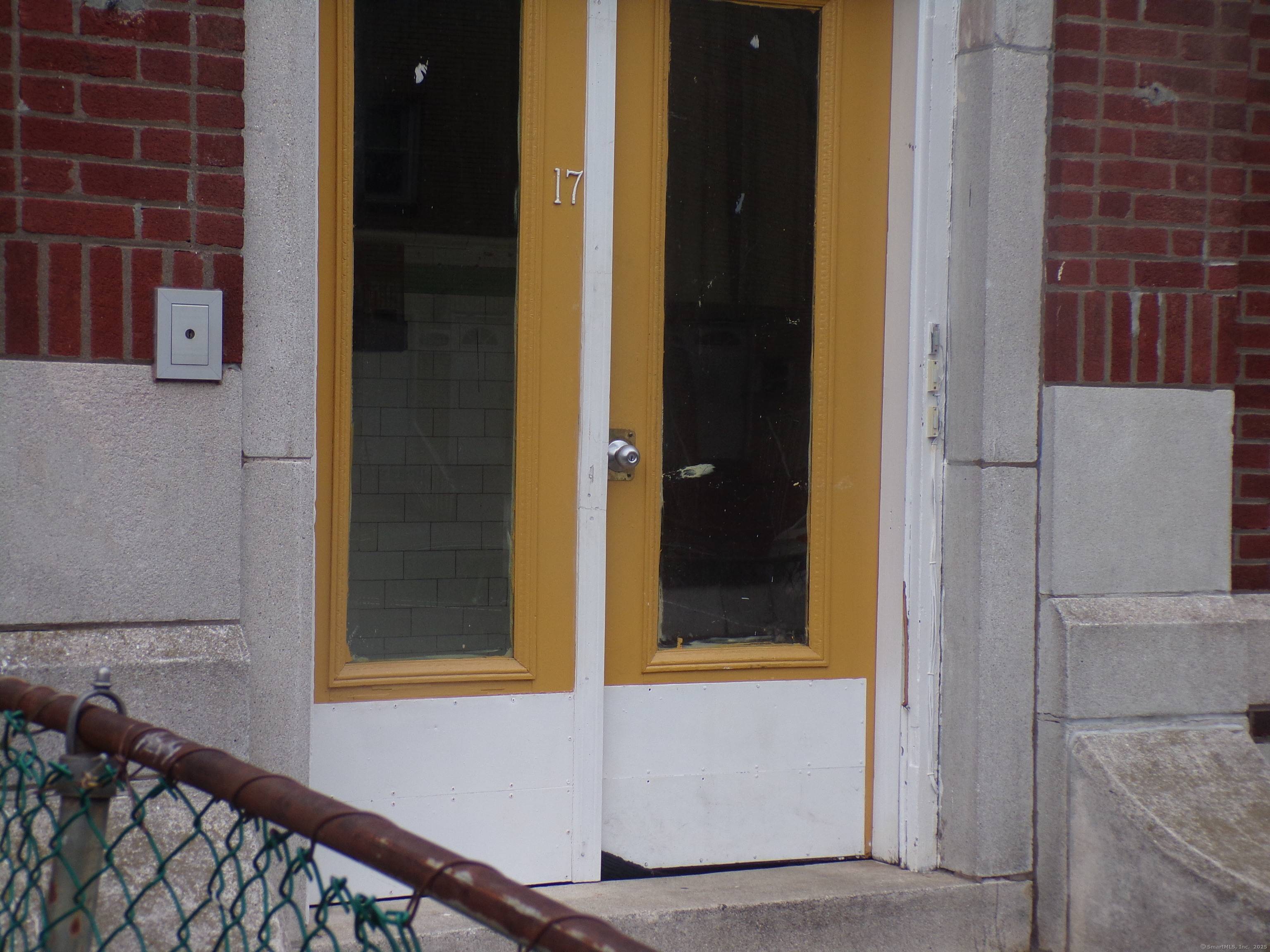 Solid three family brick structure, boasting good mechanicals, and finished living space in basement.
