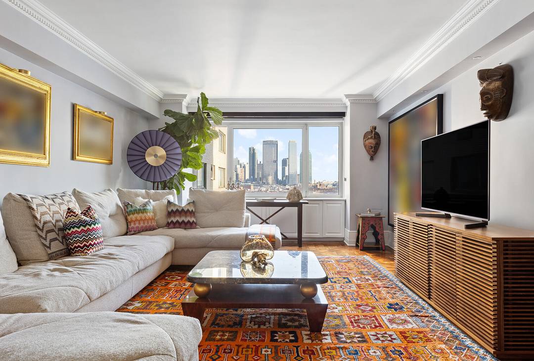 A rare floor through sanctuary with sweeping river and skyline views awaits at Residence 10H at 45 Sutton Place South.