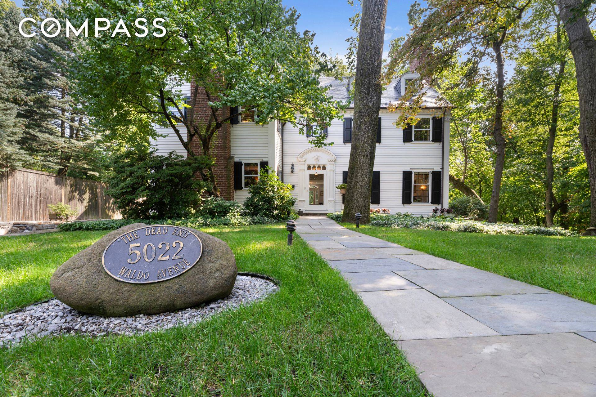 At the end of a cul de sac in the landmarked Fieldston community stands this exceptional colonial revival home.