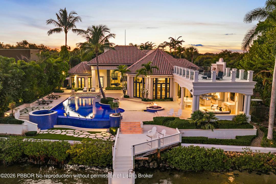 Located on one of the finest lots in Admiral's Cove, this signature, turn key property enjoys endless views of nothing but water and nature with 115 feet of frontage, directly ...
