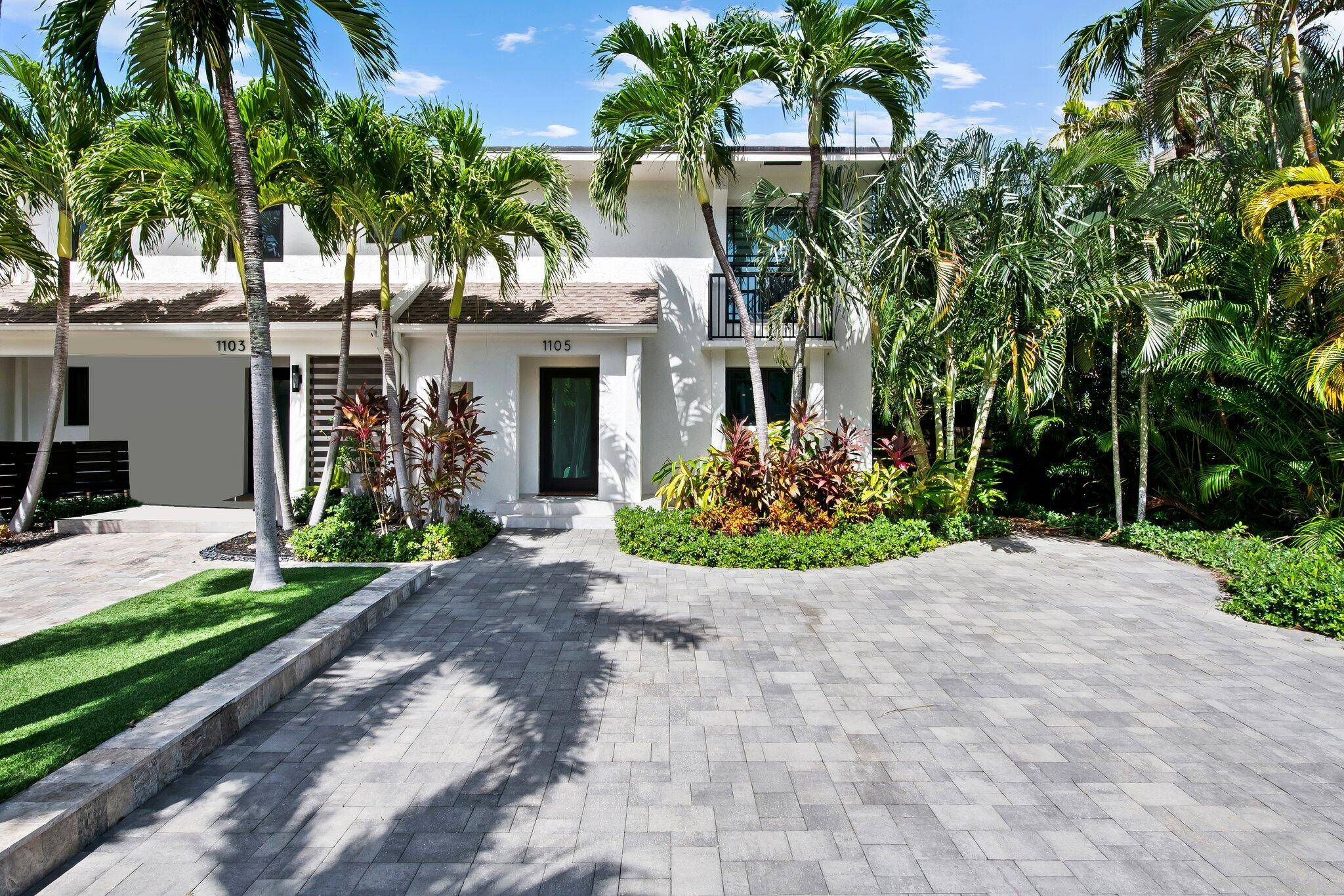 Beautifully appointed townhome located on a quiet street one block from the beach in the highly sought after beach town of Highland Beach.