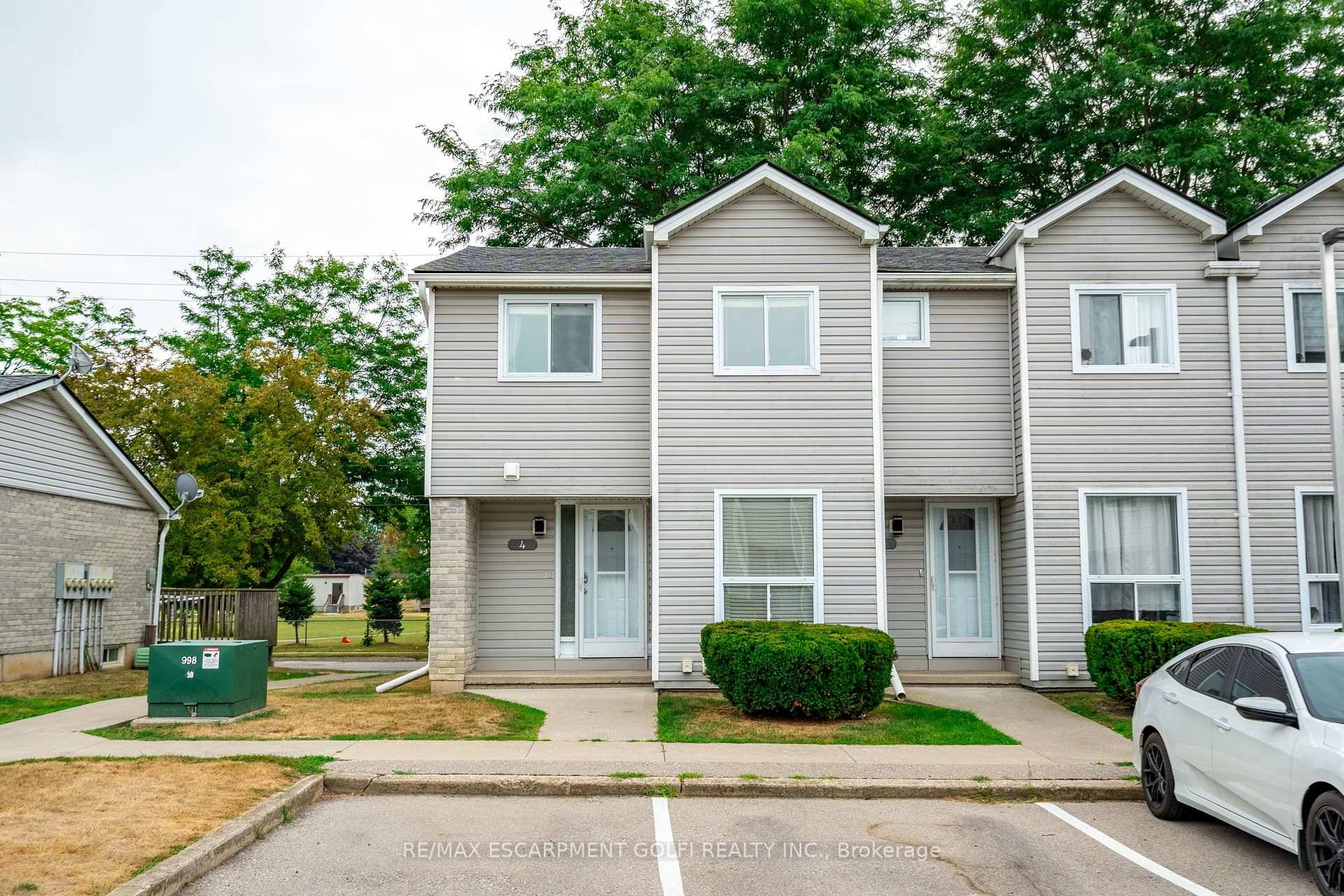 Welcome to 476 Grey St., Unit 4 a charming end unit townhome nestled in the heart of Brantford This 2 storey features three bedrooms, one and a half bathrooms, with ...