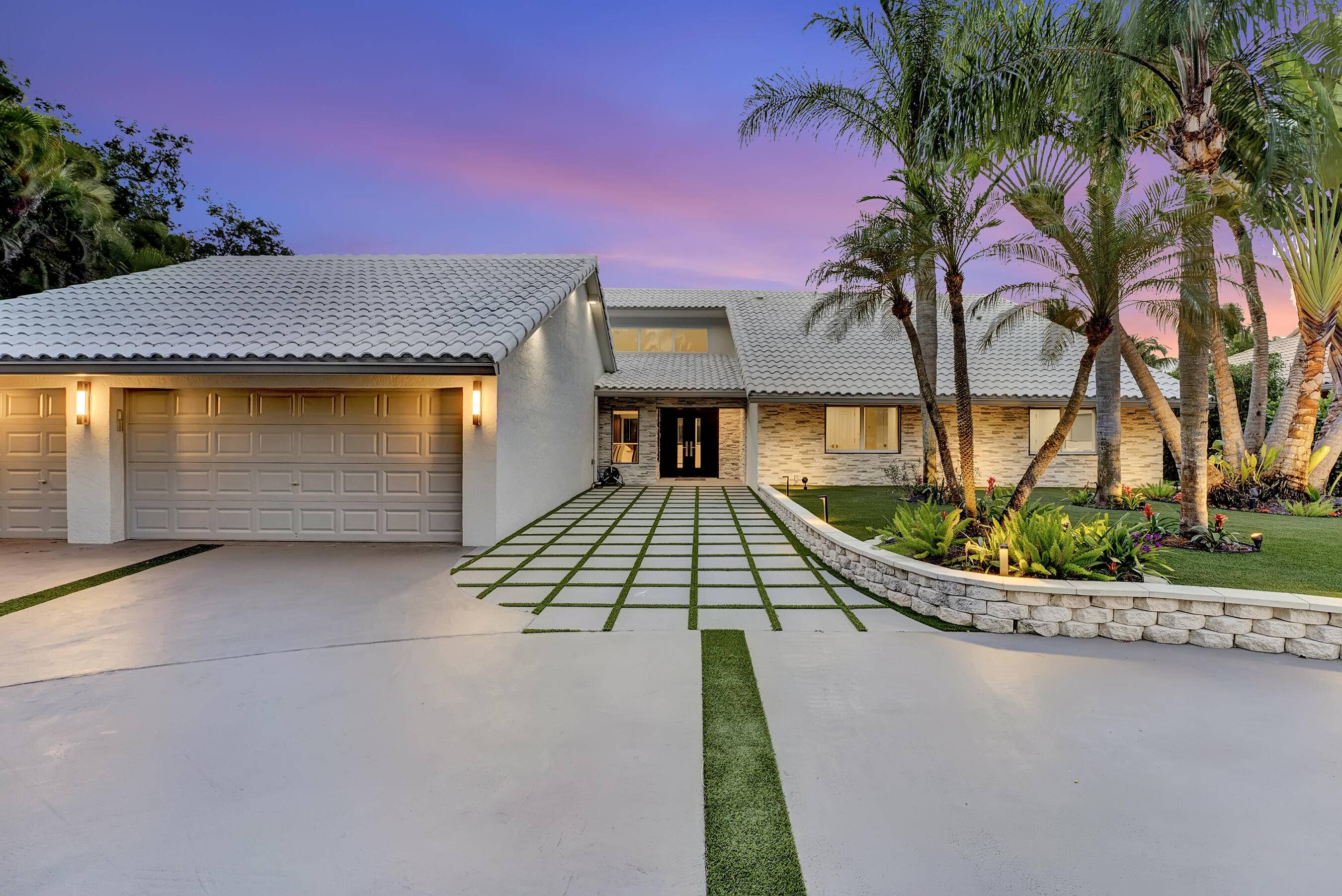 Prepare to be transported to a world of luxury and tranquility with this recently renovated masterpiece situated on one of the largest lots in the prestigious Delaire Country Club.