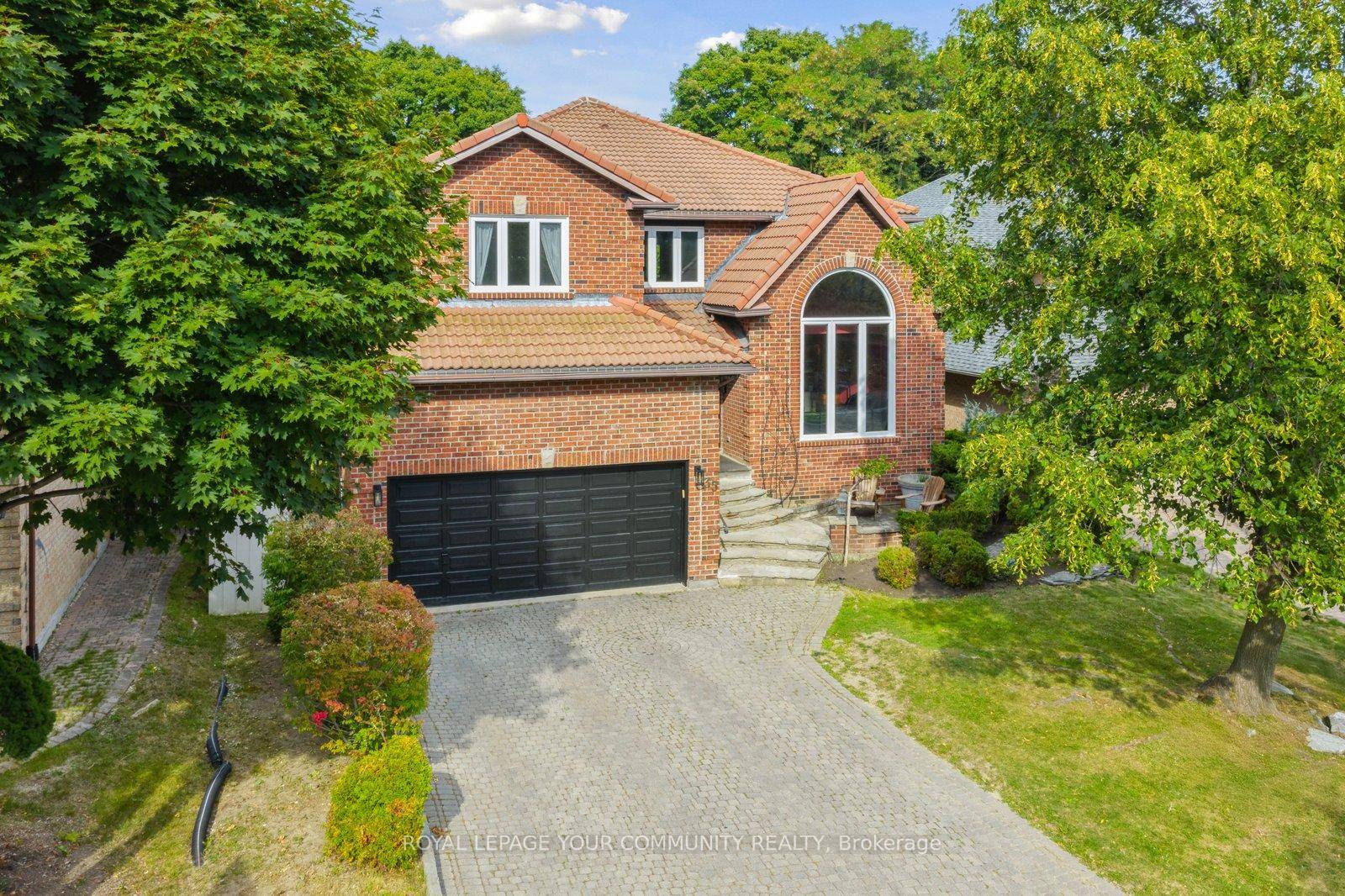 Rarely available magnificent ravine lot home in one of the most desirable locations.