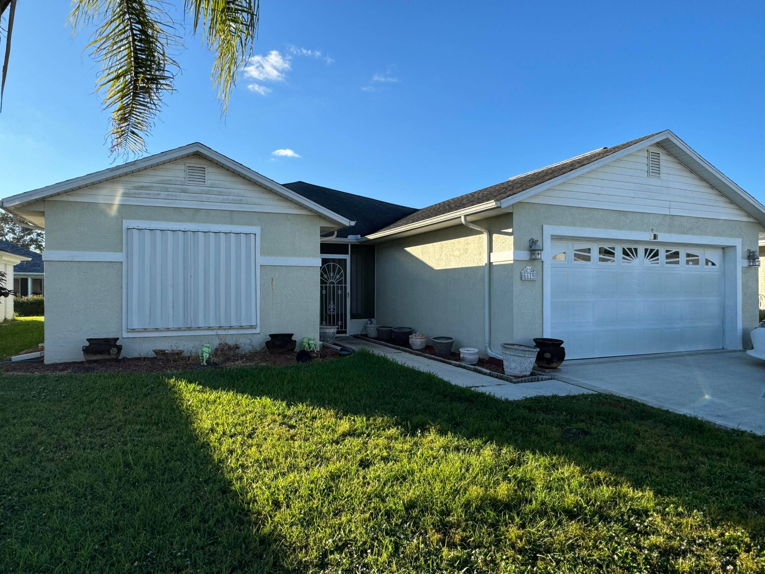 3 bed 2 bath 2 car garage situated in Spanish Lakes Fairways 55 community.