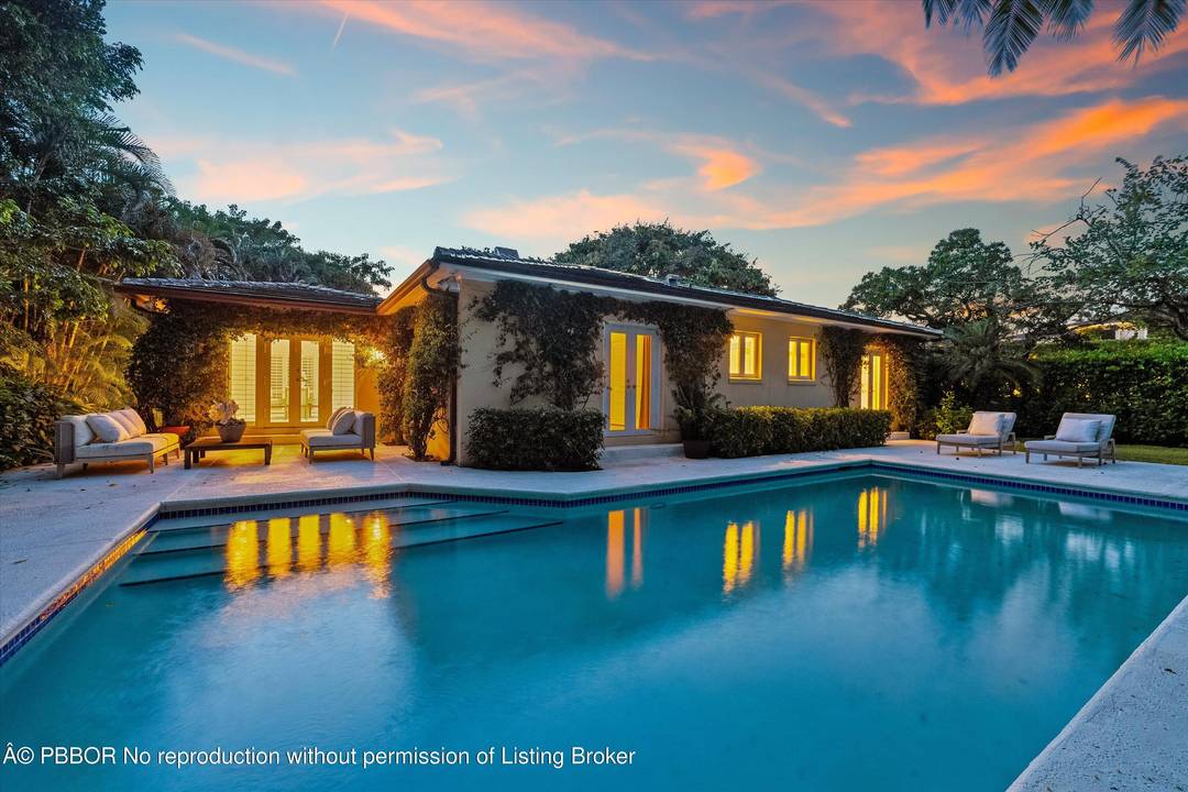 Highly sought after North End Bermuda style 3 BR, 3 BA home plus office situated on a 13, 500 SqFt Lot.