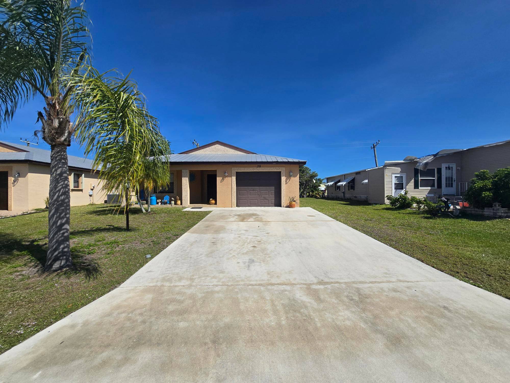 Spacious 2 Bedroom, 2 Bath CBS home in the desirable Spanish Lakes Country Club Village !