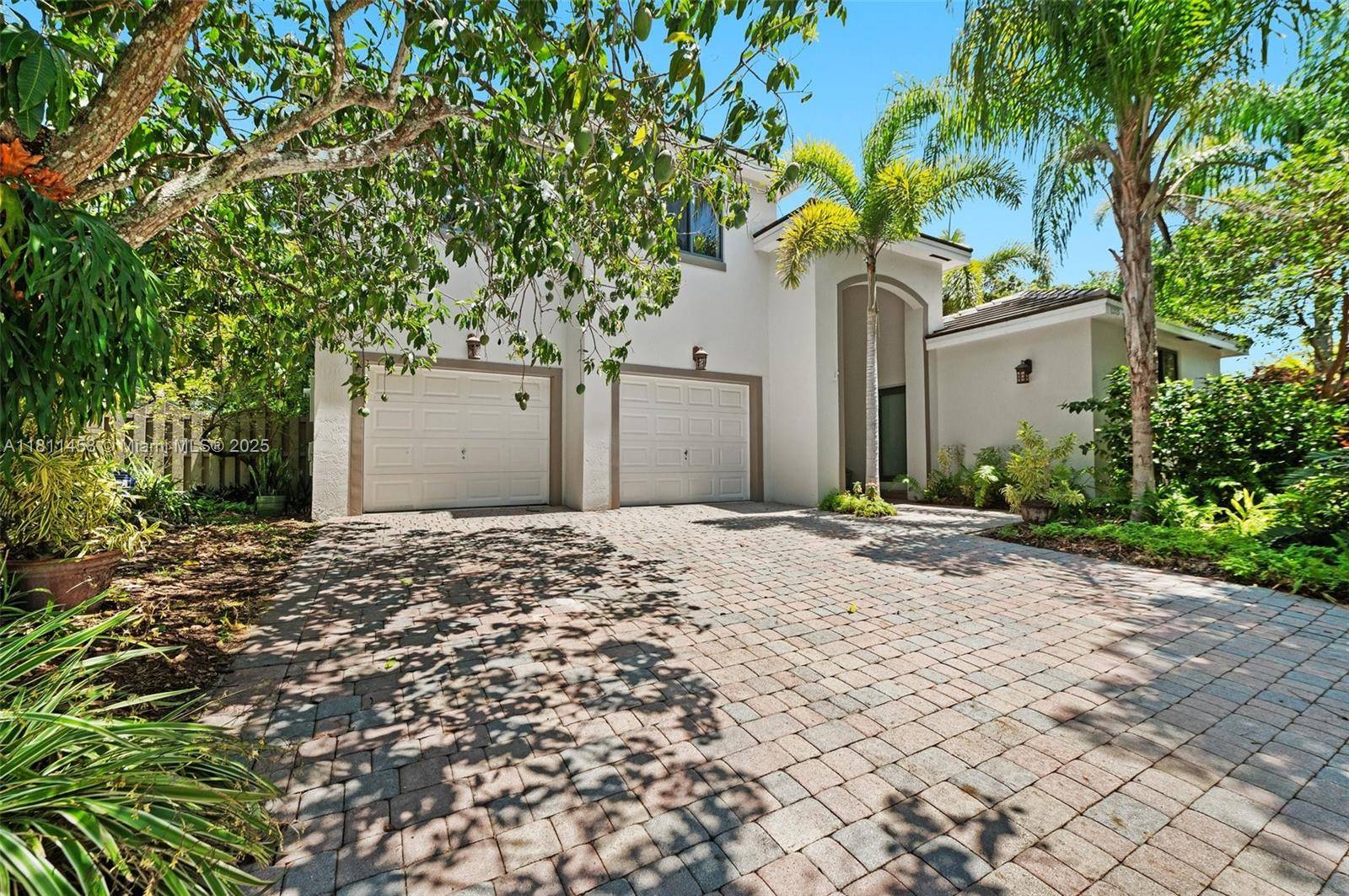 Beautiful lush tropical oasis surrounding this 5 3.