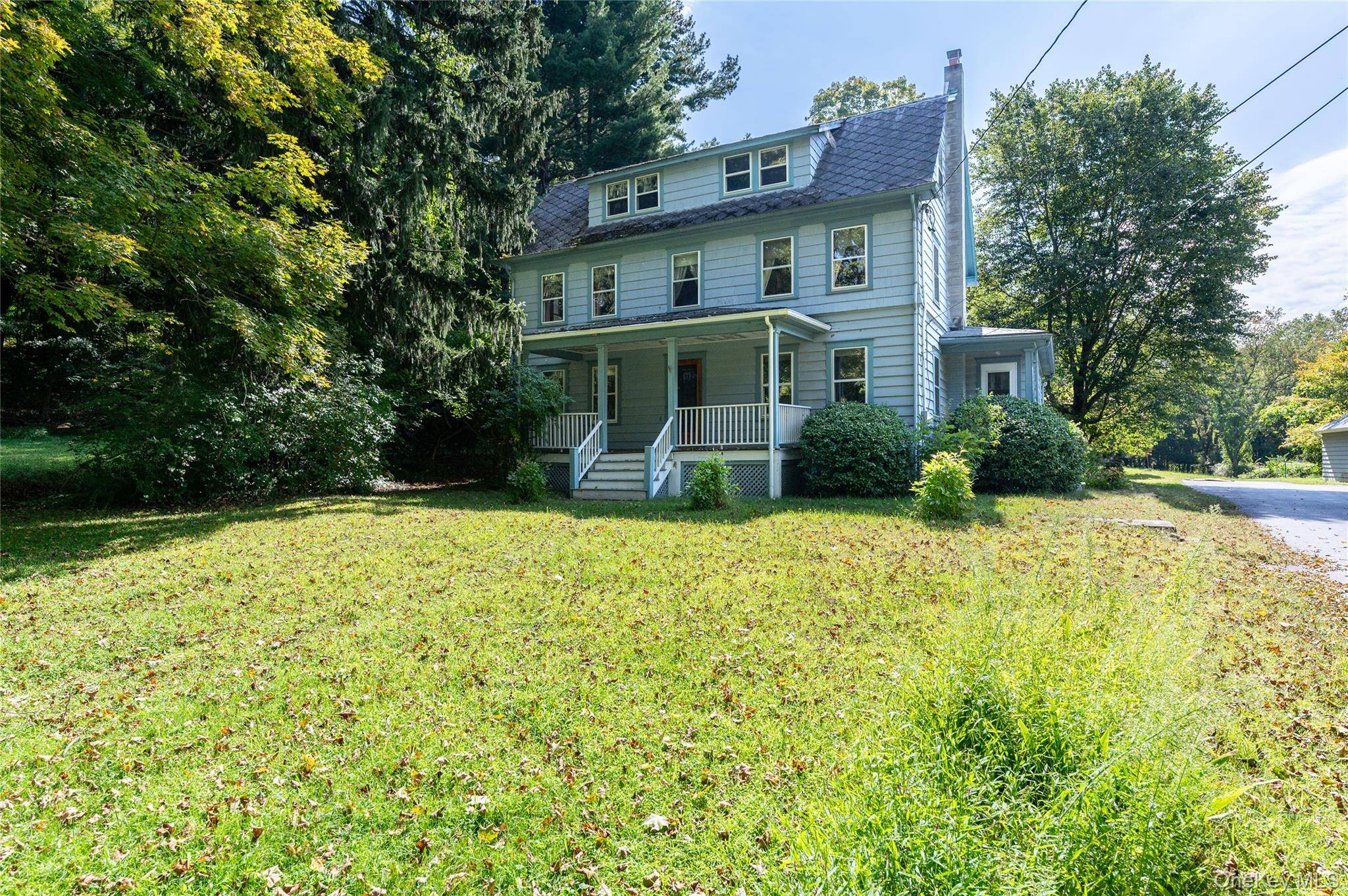 Set on nearly 15 private acres, in half acre zoning, bordering scenic Ward Pound Ridge Reservation, this classic 1930s Colonial blends timeless character with endless potential.