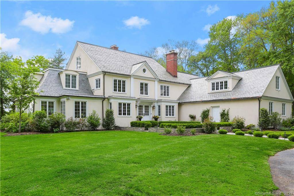 Discover your private sanctuary at the end of a serene cul de sac in Greenfield Hill.