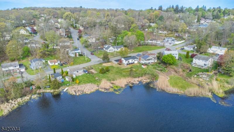 Welcome to this fully renovated lakefront gem in the desirable Mount Glen Lakes section of West Milford.
