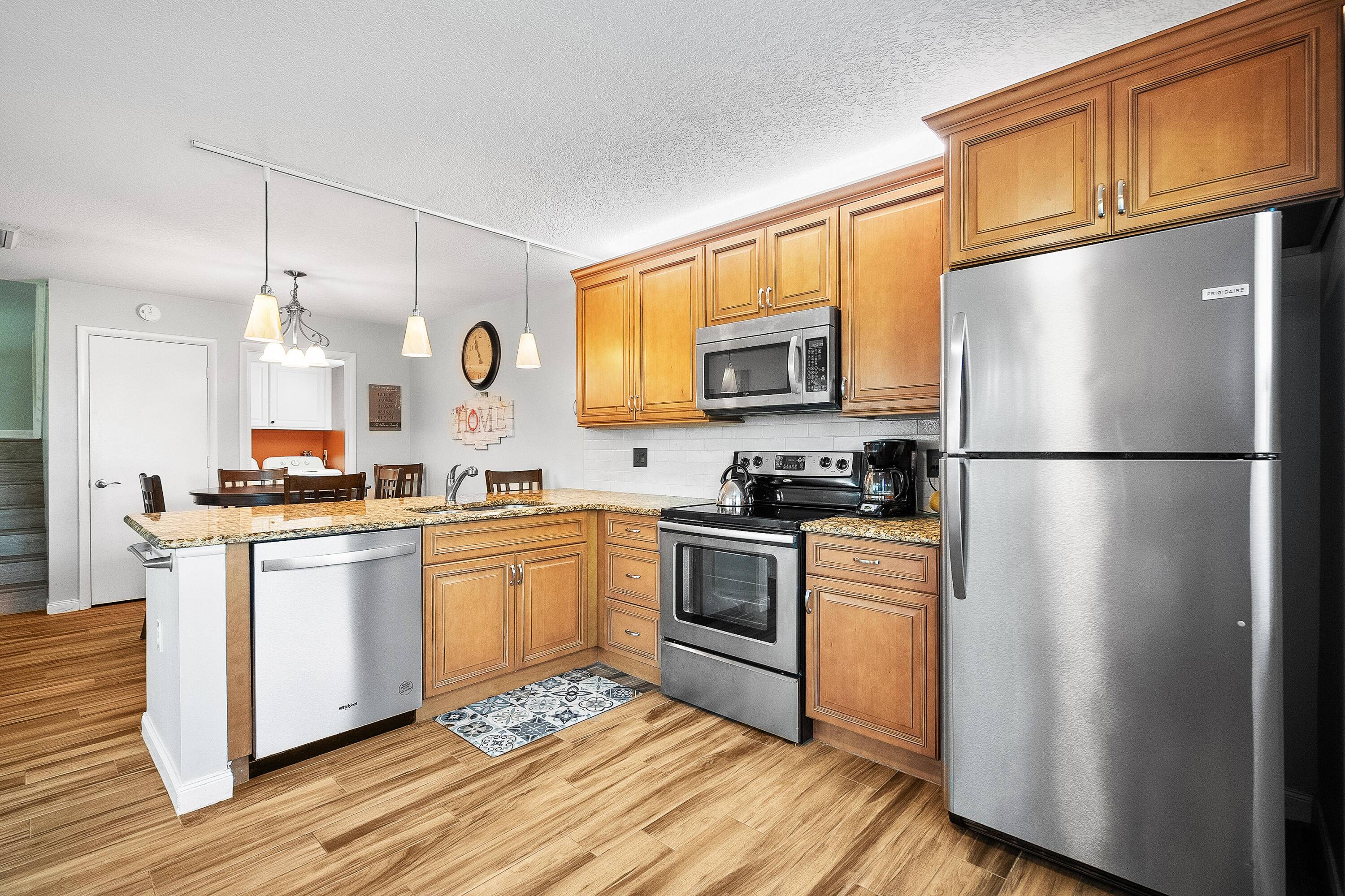 Welcome to this stunning Stamford model townhome in the gated community of Sunset Trace !