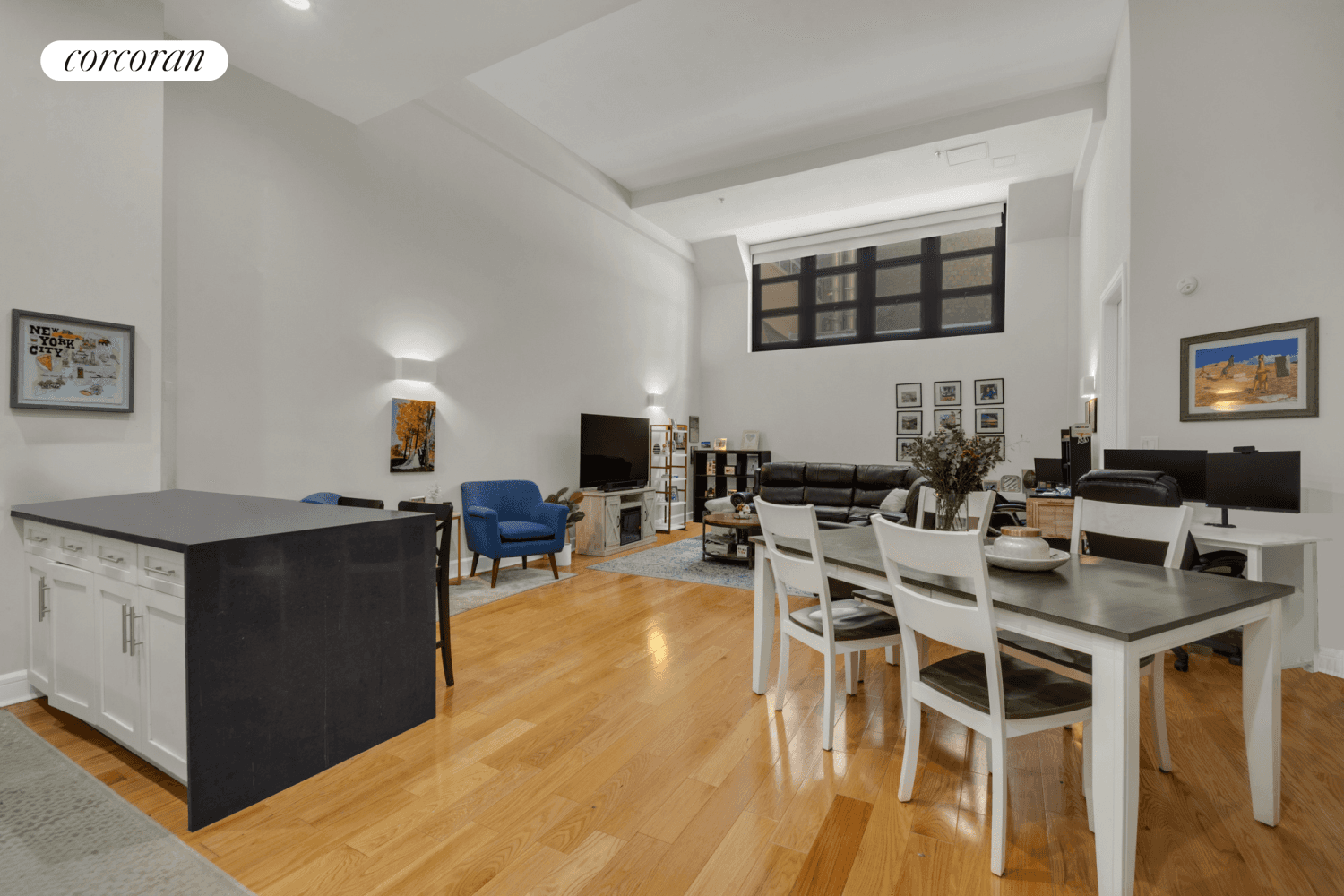 This stunning oversized one bedroom, one bath loft boasts soaring 16 foot ceilings and newly installed red oak hardwood floors.