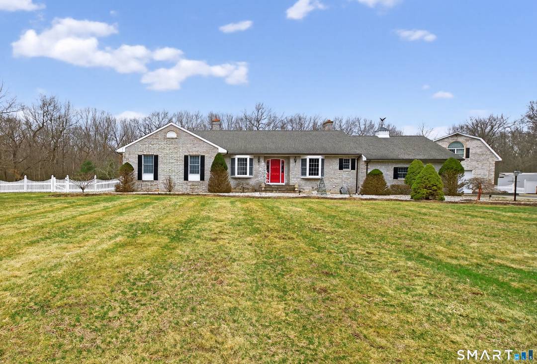Welcome to this beautifully maintained home set on over 10 private acres in desirable South Windsor.