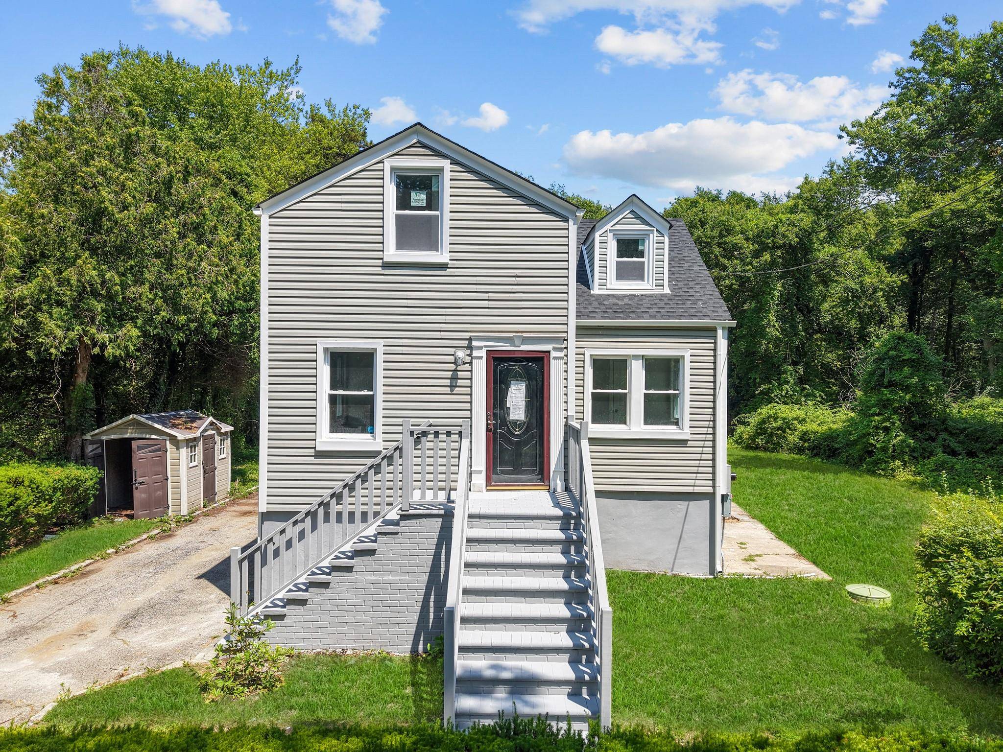 35 Cypress is a meticulously renovated single family tucked away on a super quiet block of Wyandanch.