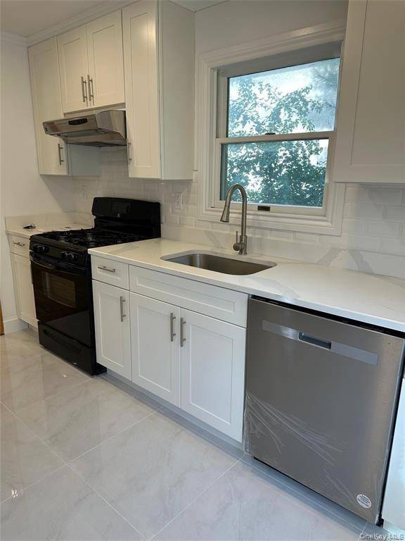 A must see ! Charming, freshly painted amp ; fully Renovated 3 4 bedroom house with two full baths one in each floor.