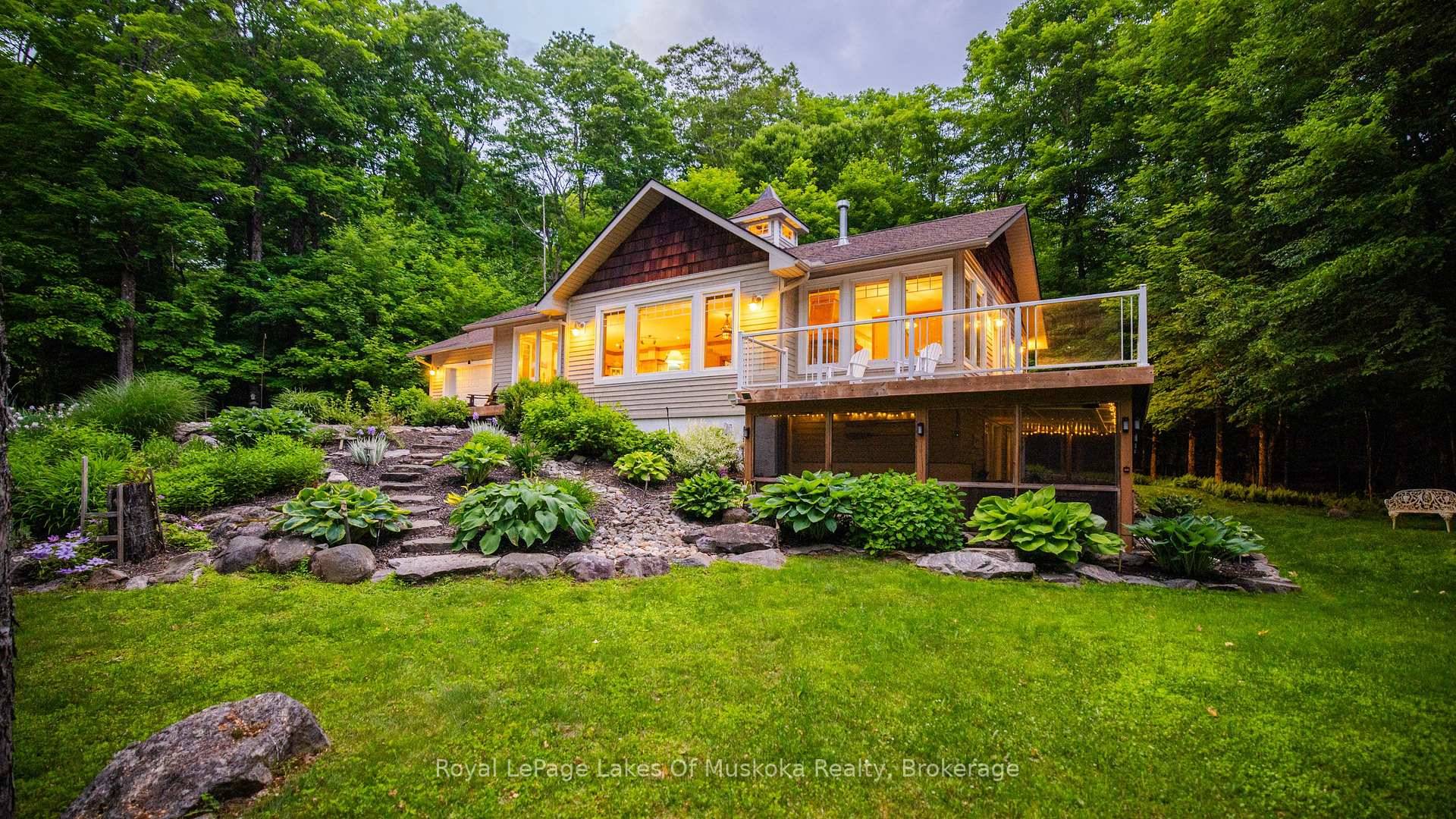 Enjoy privacy and peace in this charming bungalow across from beautiful Menominee Lake !