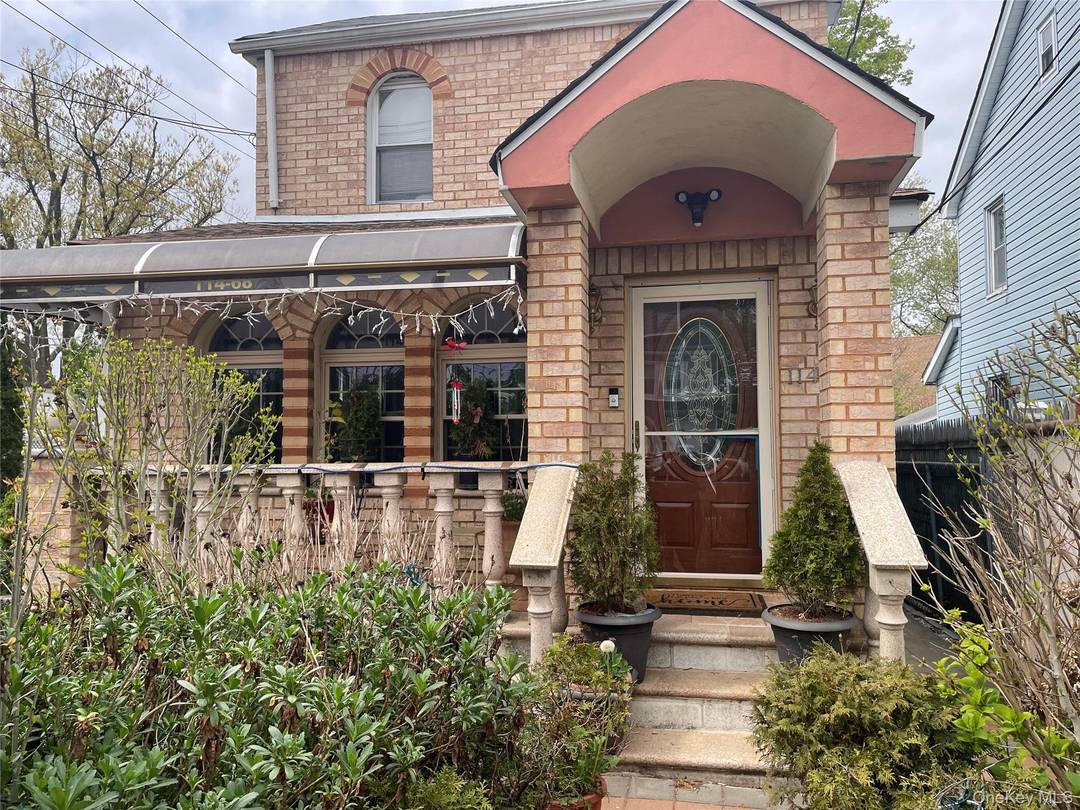 Elegant Cambria Heights Corner Residence Priced Under 800K Discover refined living in this beautifully upgraded corner property located at 114 68 208th Street in sought after Cambria Heights.