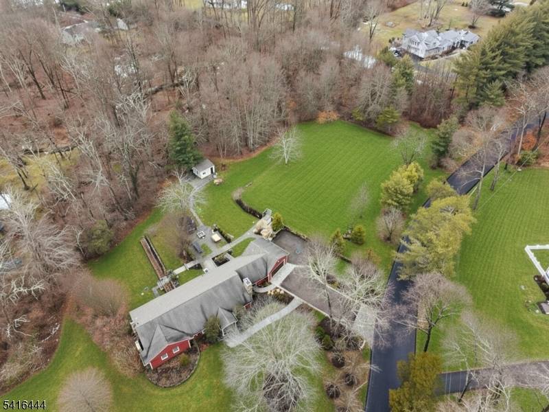 Experience this RARE Sprawling Ranch with HardiePlank Siding situated on a MASSIVE 3 Acre Park Like Estate property within minutes to Downtown Morristown located on the East Side of Mendham ...