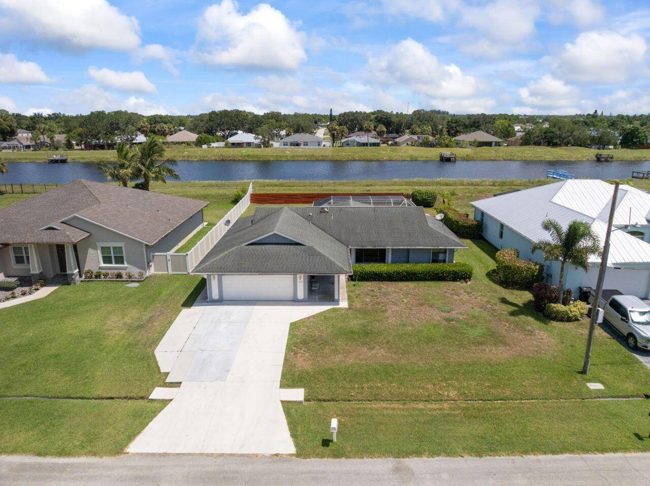 Gorgeous 3 bed, 2 bath, 2 car garage pool home on a quiet, oversized lot backing to the C 24 canal for added privacy.