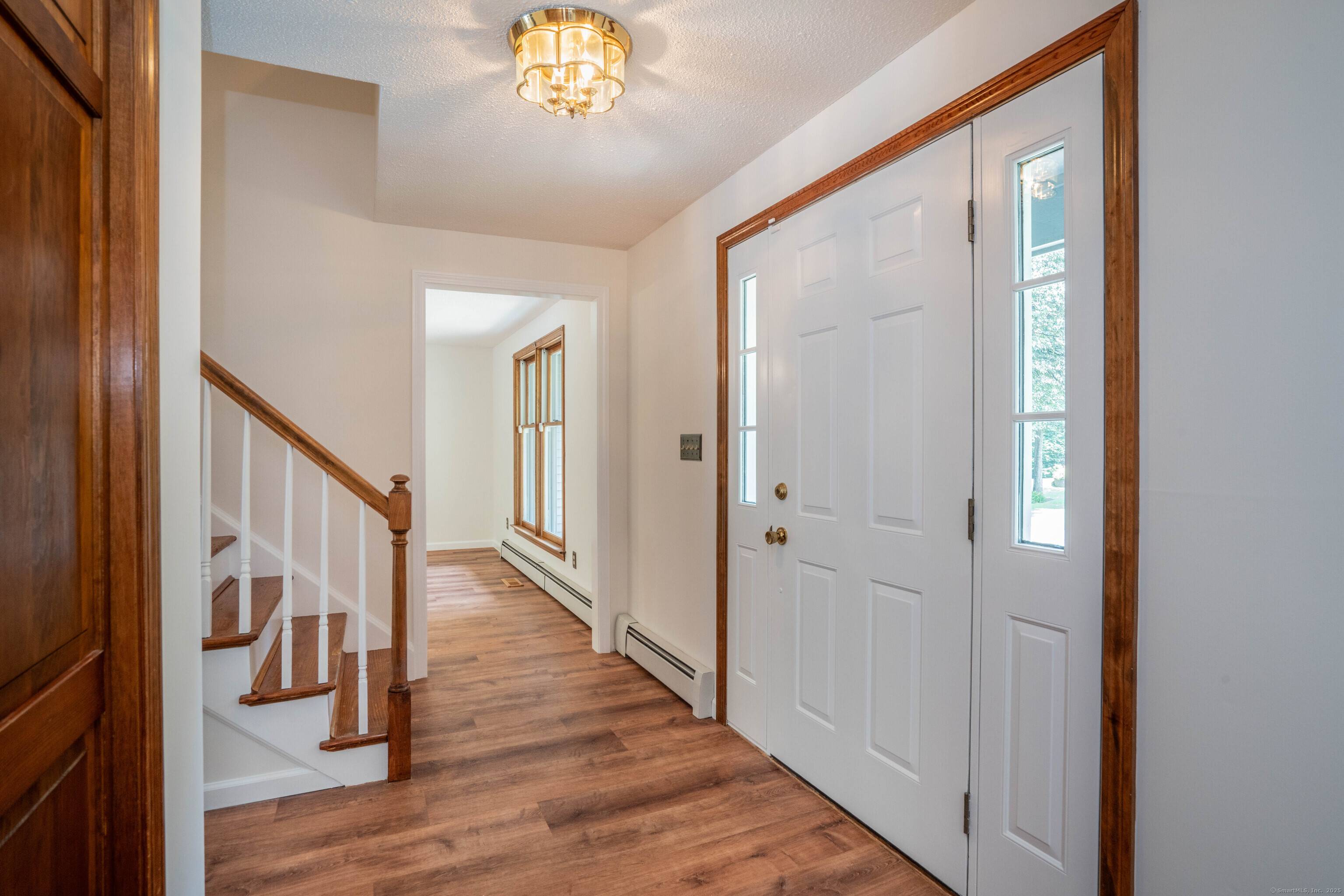 Tucked away on a quiet cul de sac in a sought after Farmington location, this beautifully maintained Colonial offers space, light, and thoughtful design.