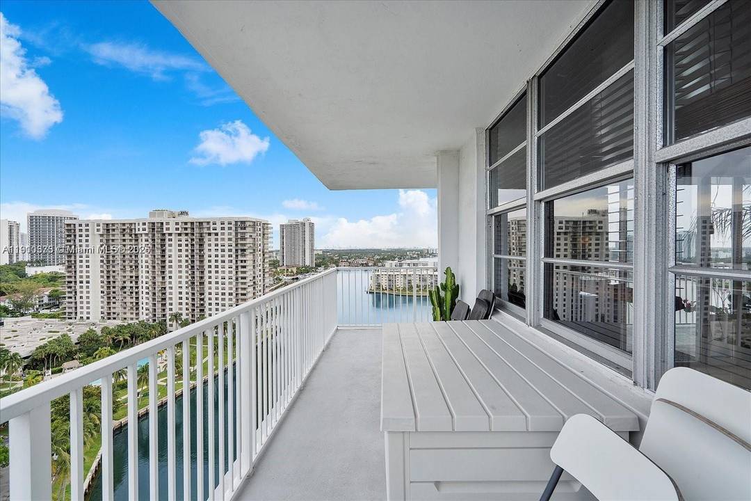 Seller Motivated ! ! This stunning 2 2 Den unit boasts breathtaking water views from its expansive balcony.