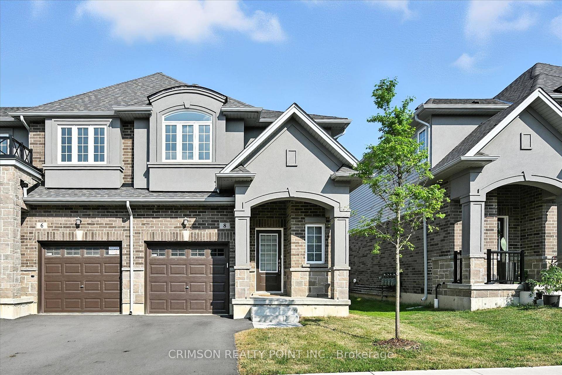 This end unit home features a bright, open concept main floor with upgraded pot lights, kitchen cabinets, and flooring there is no carpet throughout the home.