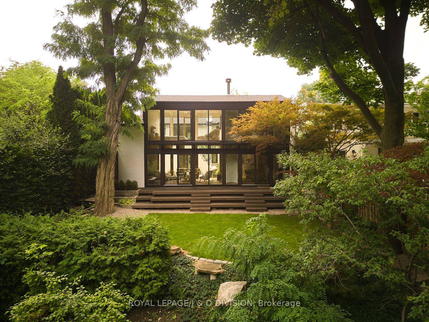 Nestled into the trees, this spectacular Rosedale home has been totally reimagined and redesigned, creating a home quite unique for Toronto.