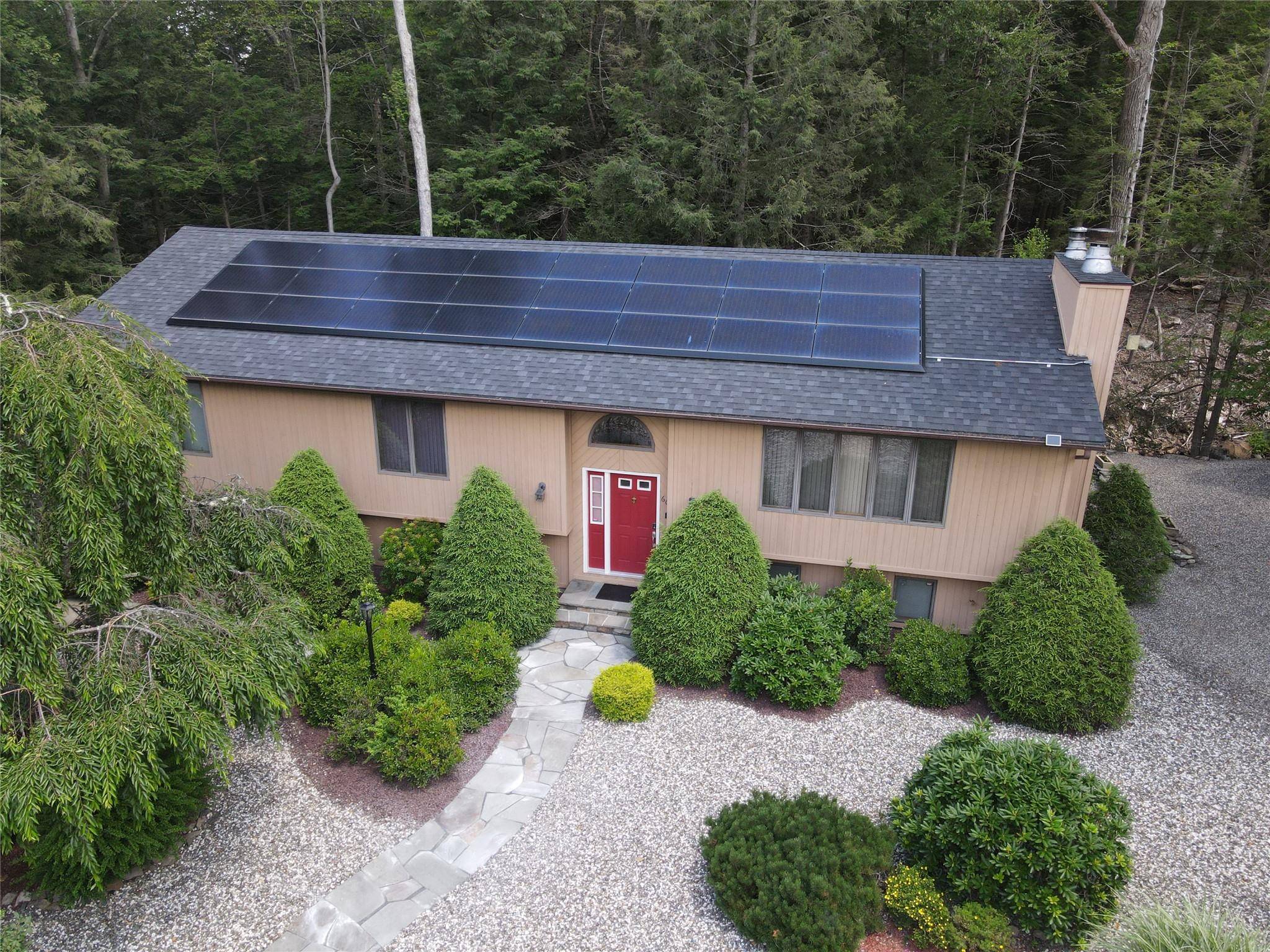 Spacious Raised Ranch on Expansive Double Lot A Private Oasis !