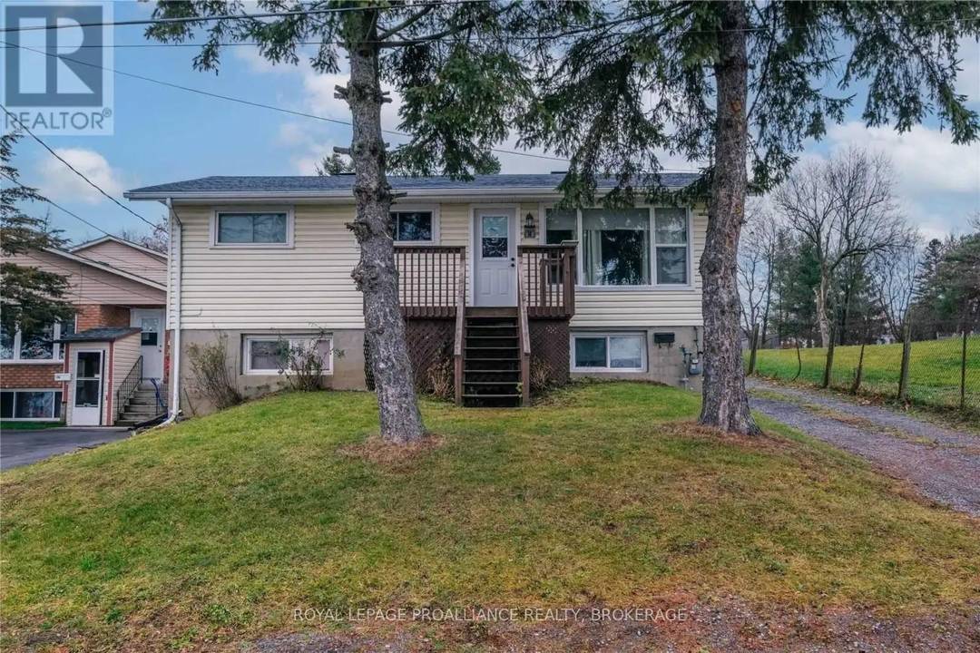 This inviting 3 bedroom, 1 bathroom main level unit features an open concept kitchen and living room, perfect for entertaining or relaxing with friends or family.