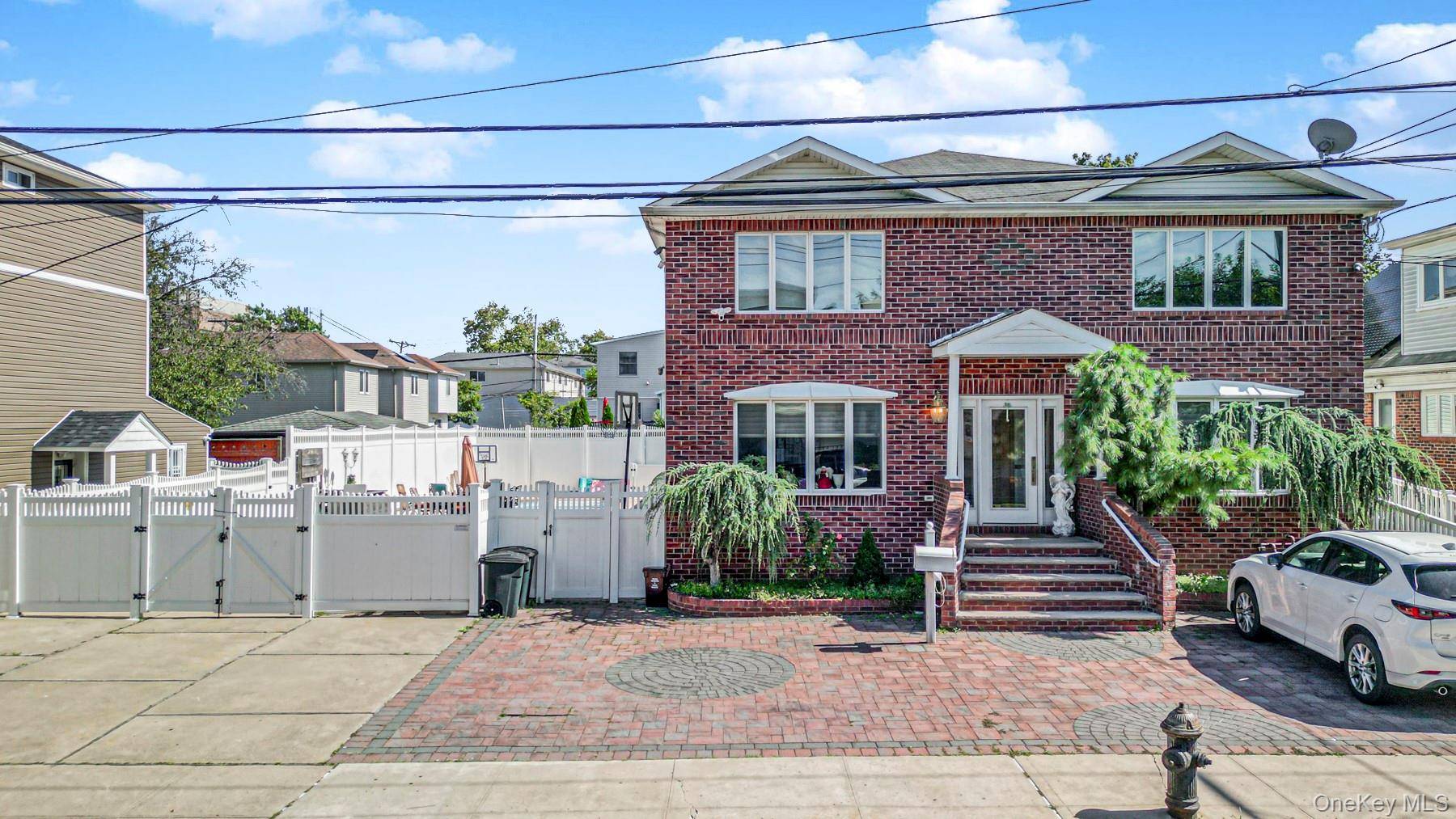 Custom Built 2 Family on 7700 sqft parcel home is on 50x100 pool is separate lot.