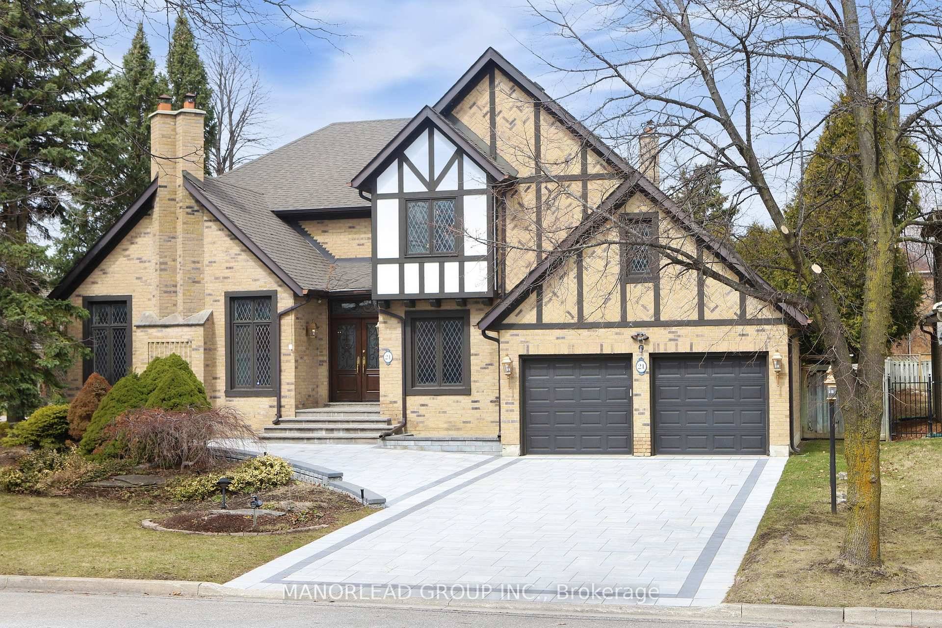 Experience refined living at 21 Dunloe Road an exquisite 4, 198 sq ft Tudor style estate in the heart of Richmond Hills most sought after enclave, Bayview Hill.