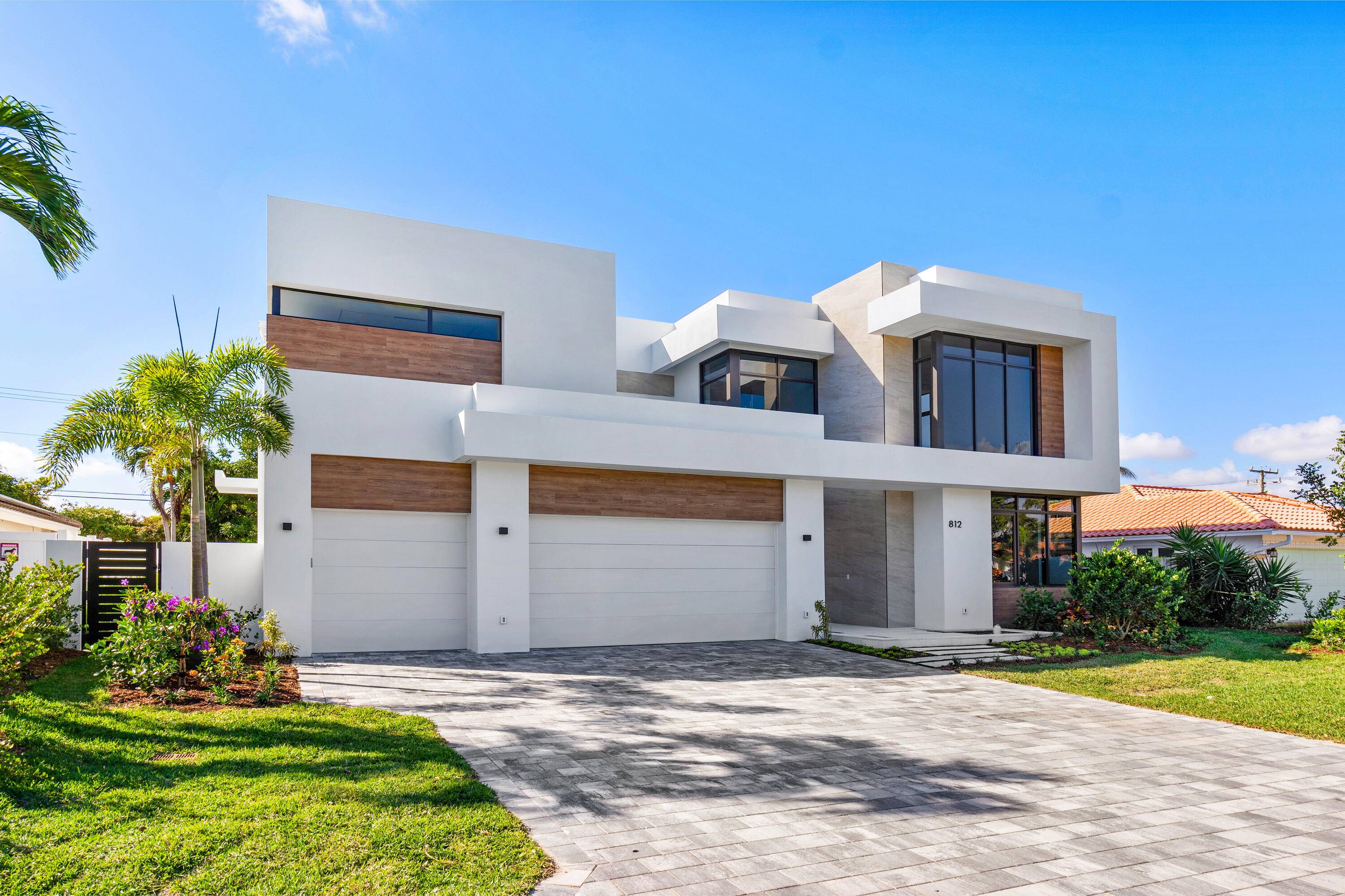 Welcome to 812 Malaga, an architectural masterpiece in Boca Raton's coveted seaside enclave of Spanish River Land.