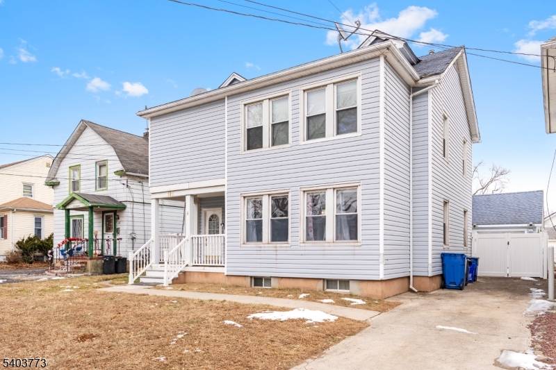 Well maintained 2 family home with separate utilities and a functional layout perfect for homeowners seeking flexibility.