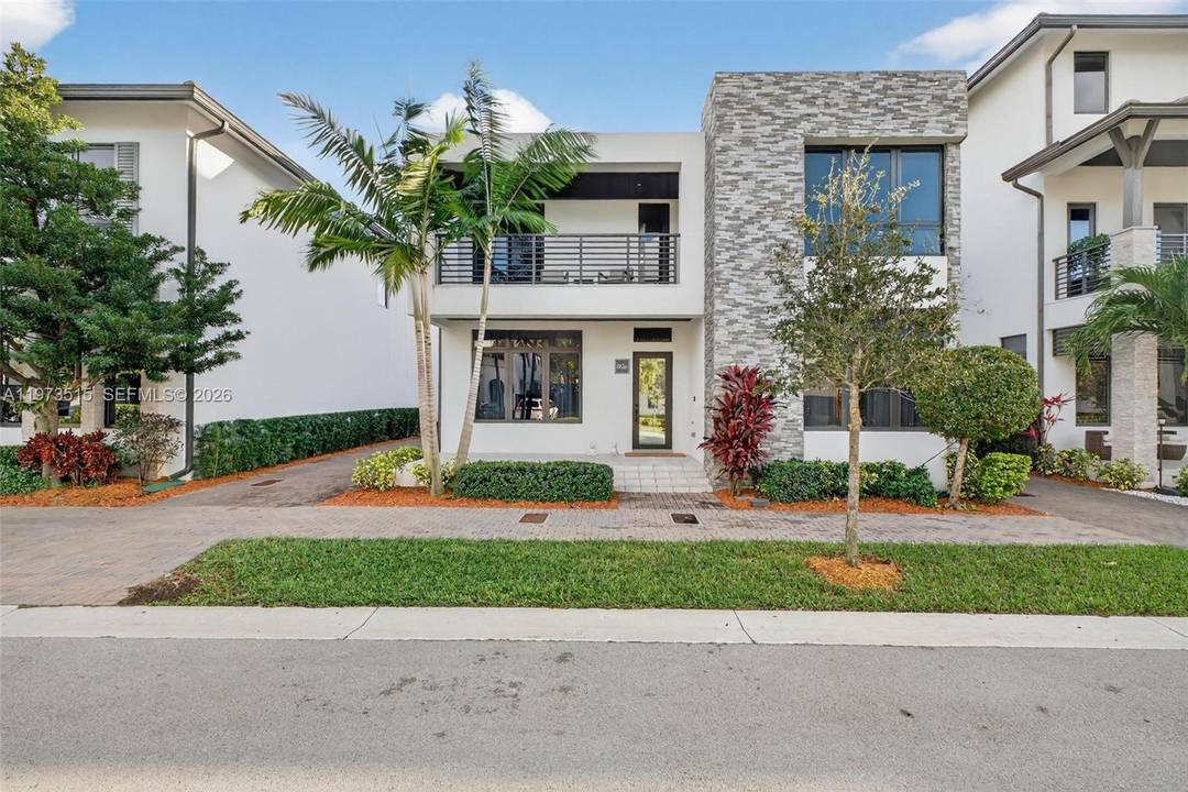 Exquisitely upgraded luxury residence located in the prestigious Downtown Doral South community.